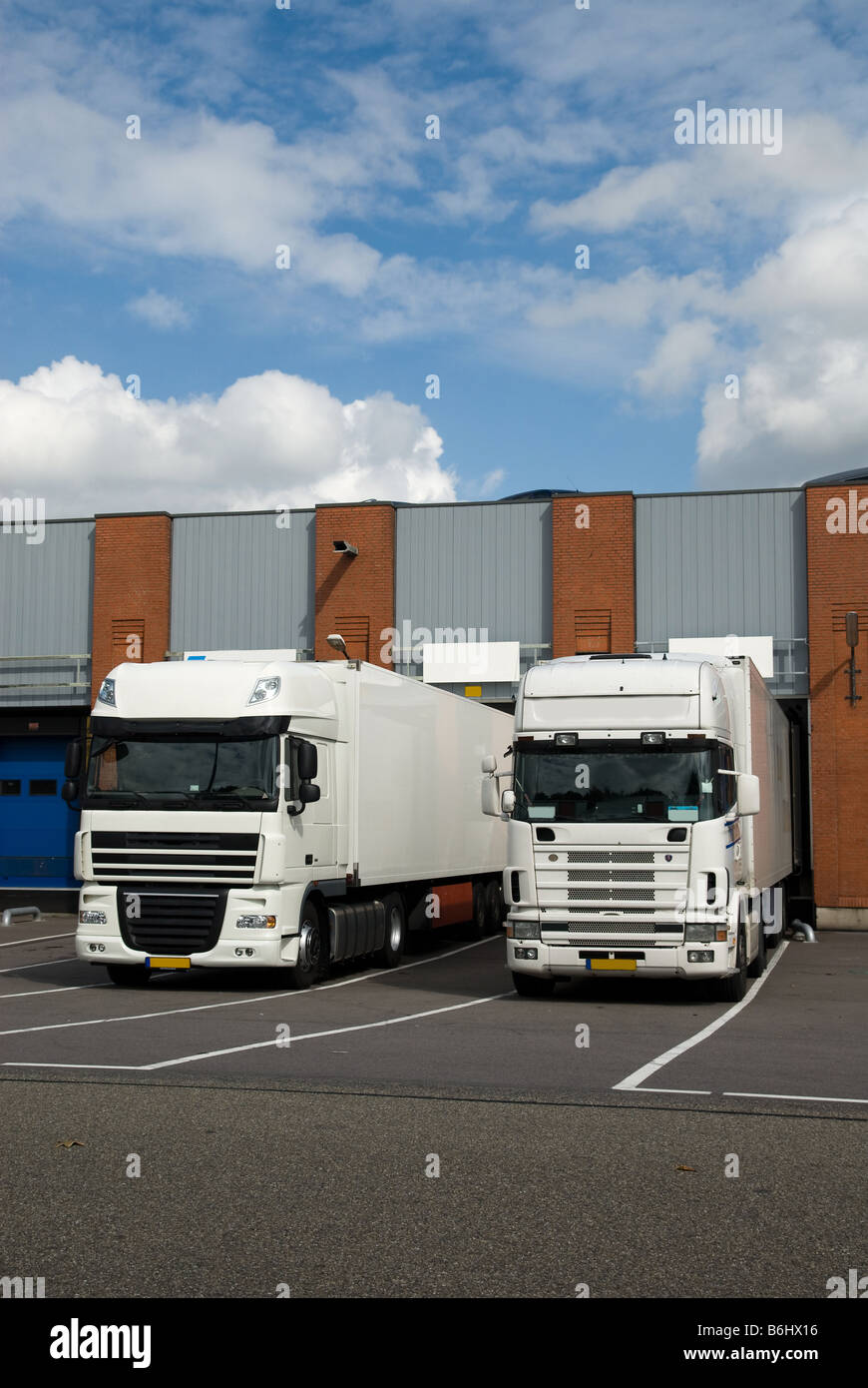 big trucks at a loading dock Stock Photo