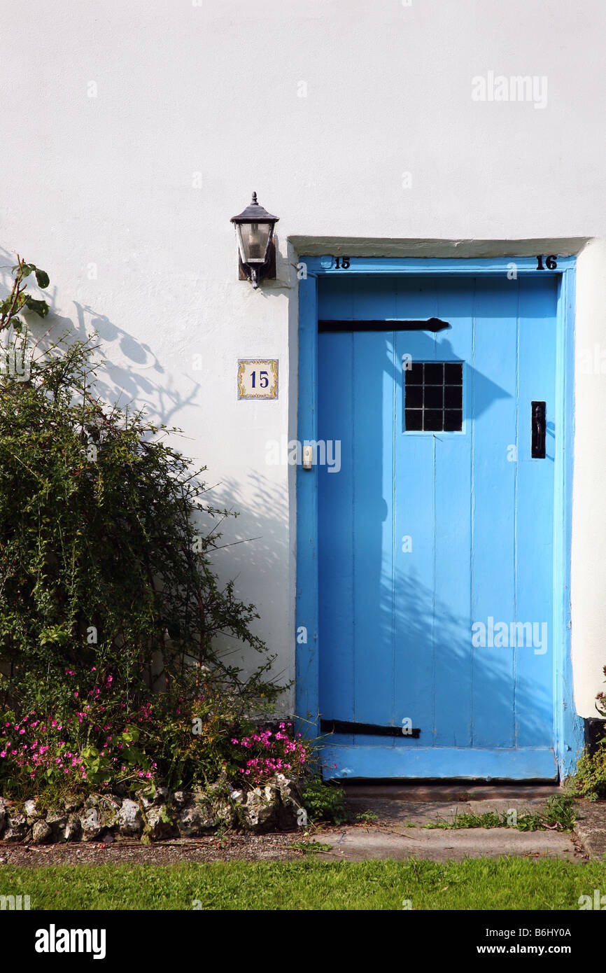 Blue Door Of A White Washed Thatched Cottage Inn The Dorset