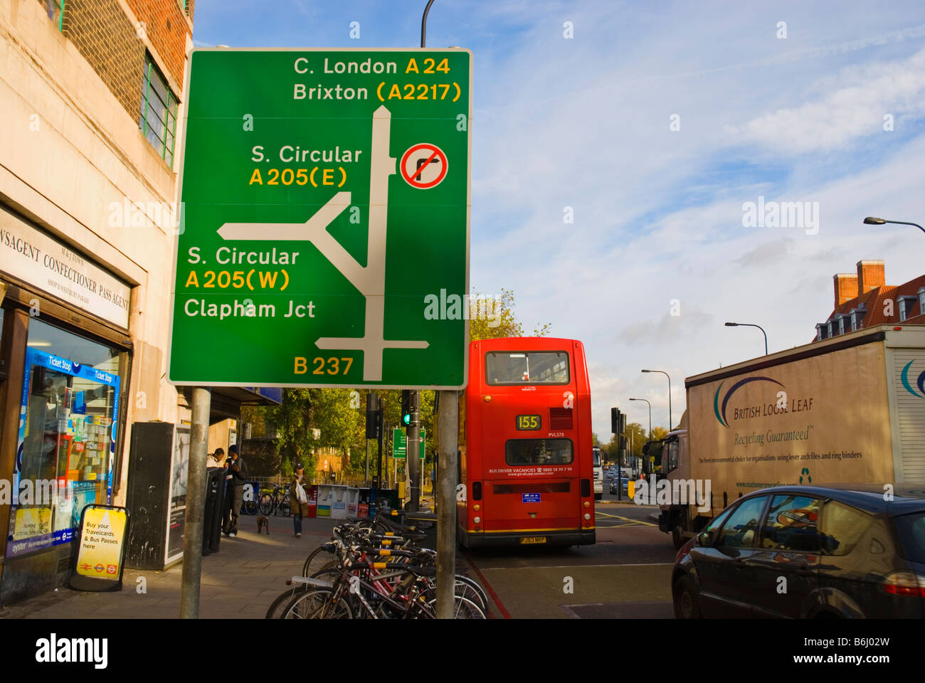 Traffic and signs outside Clapham South tube station in London England UK Stock Photo