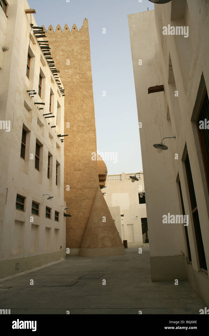 Alleyway buildings at Souq Waqif market with protruding 'shandal' beams, Qatar, Middle East Stock Photo