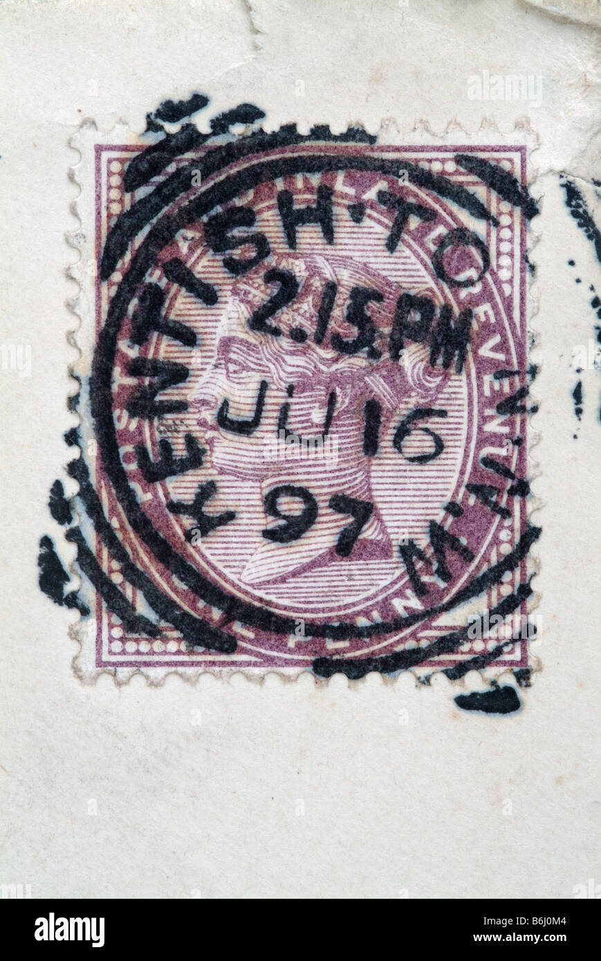 A closeup of a Penny Lilac postage stamp with a postmark dated 1897