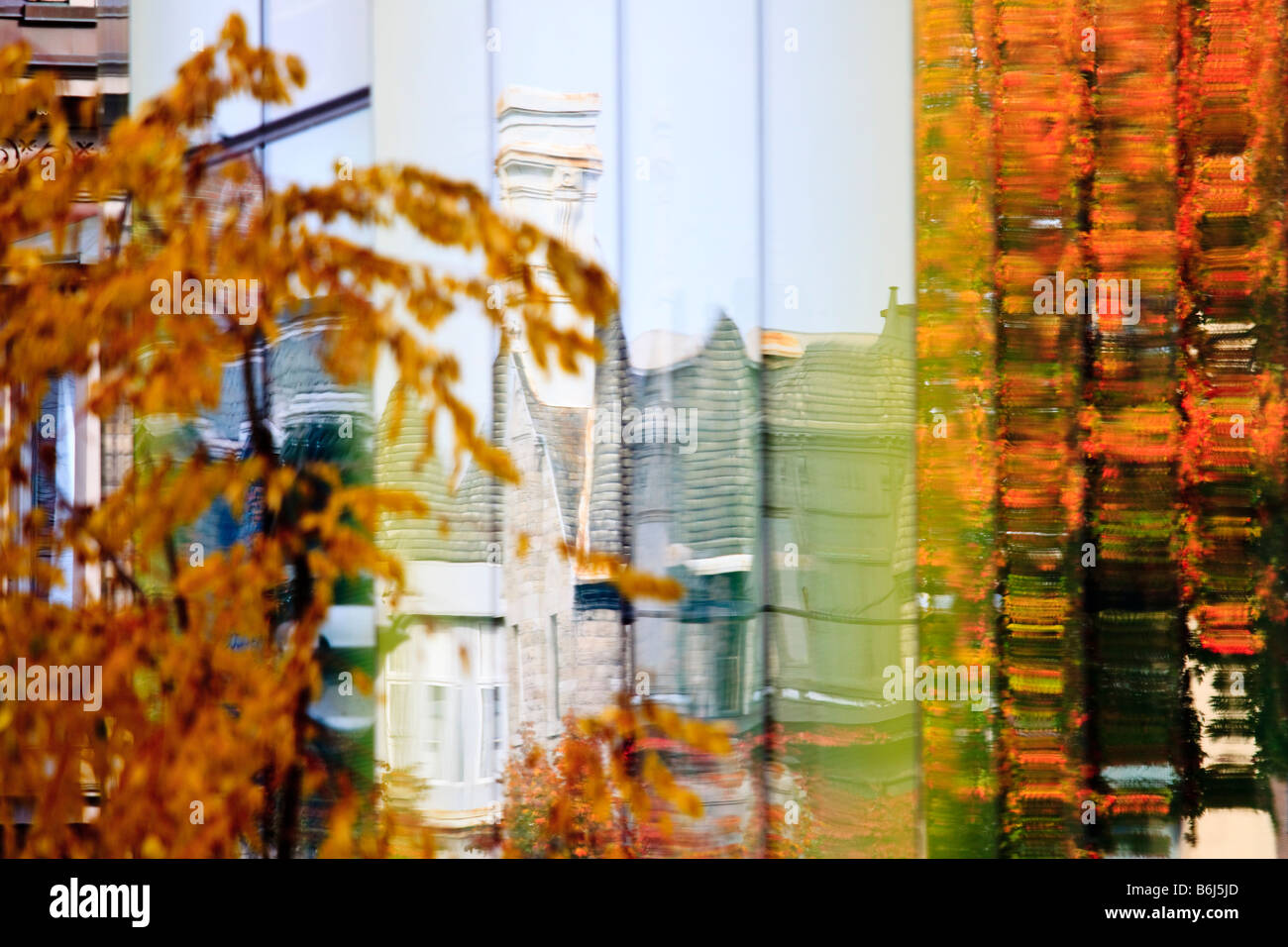 Fall reflections in glass building Montreal Canada Stock Photo
