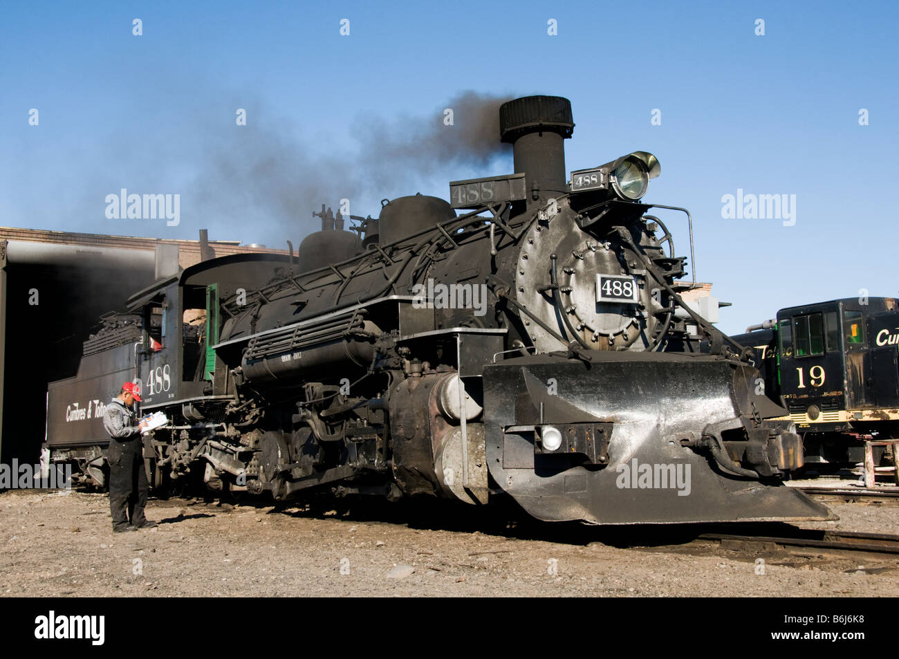 Old fashioned vintage locomotive train engine moving on tracks Stock ...