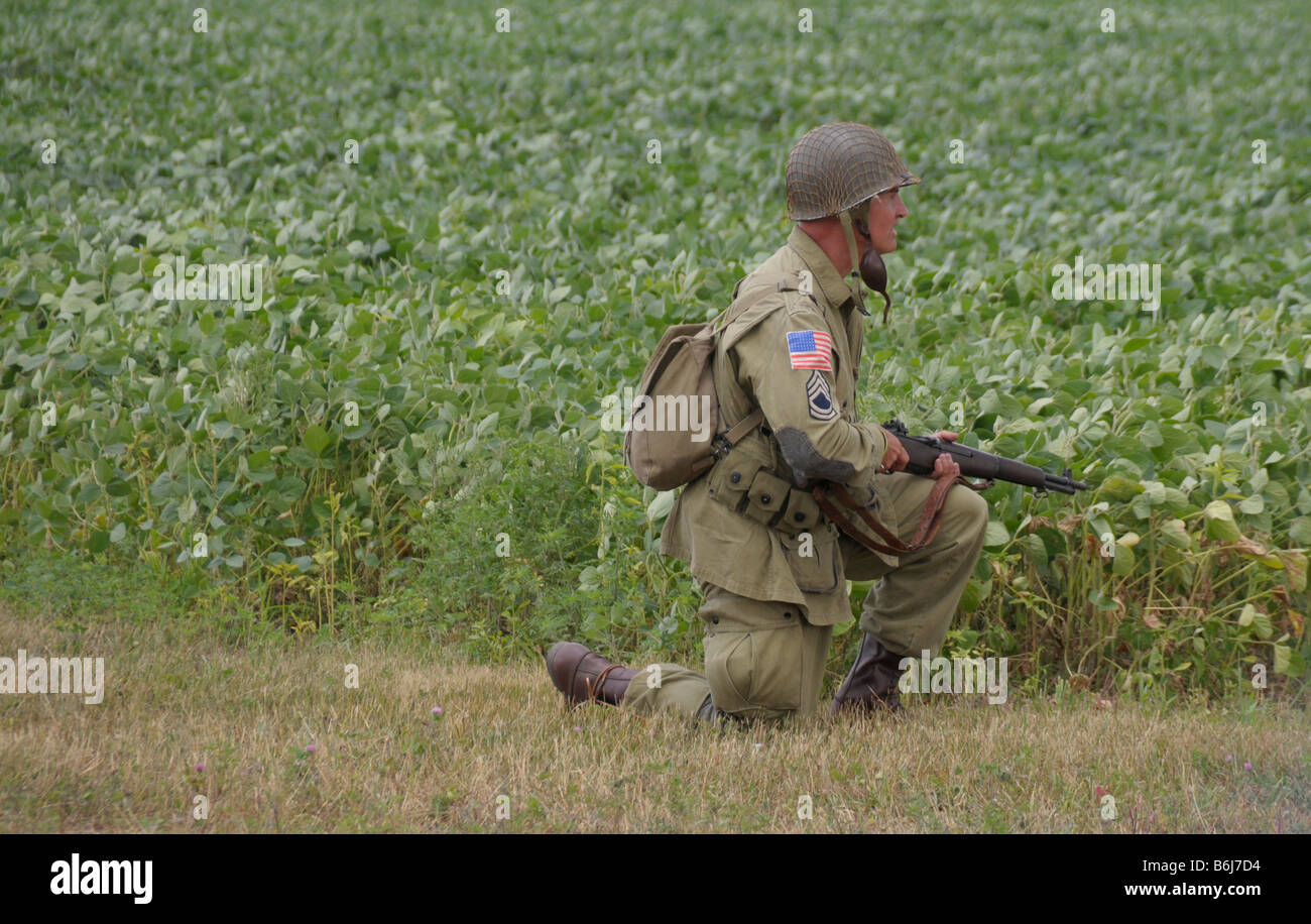 An army soldier waiting for instruction at a World War II reenactment in Bellville, Michigan Stock Photo