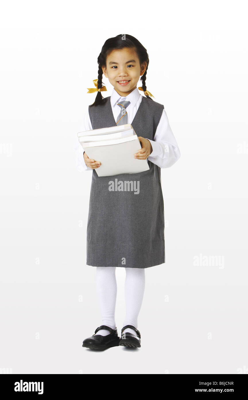School uniform girl full length skirt hi-res stock photography and ...