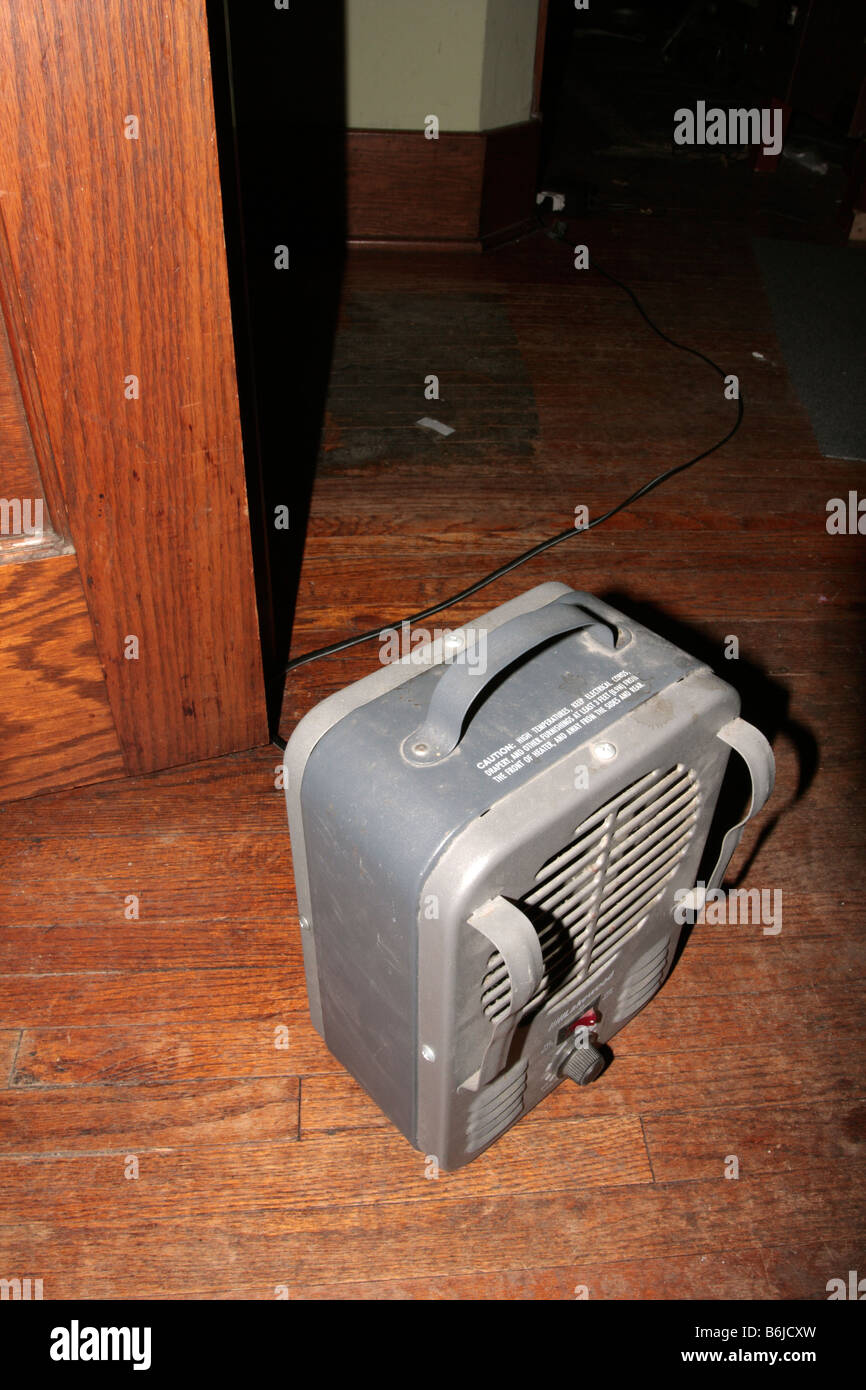Small Space Heater On Wood Floor Stock Photo 21303601 Alamy