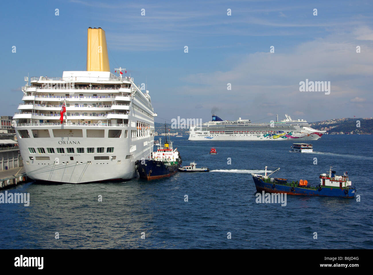 Istanbul Port on Bosporus waterway cruise ship P&O Oriana with bunkering ships attending & Norwegian Jewel ocean liner departs Turkey Europe Stock Photo