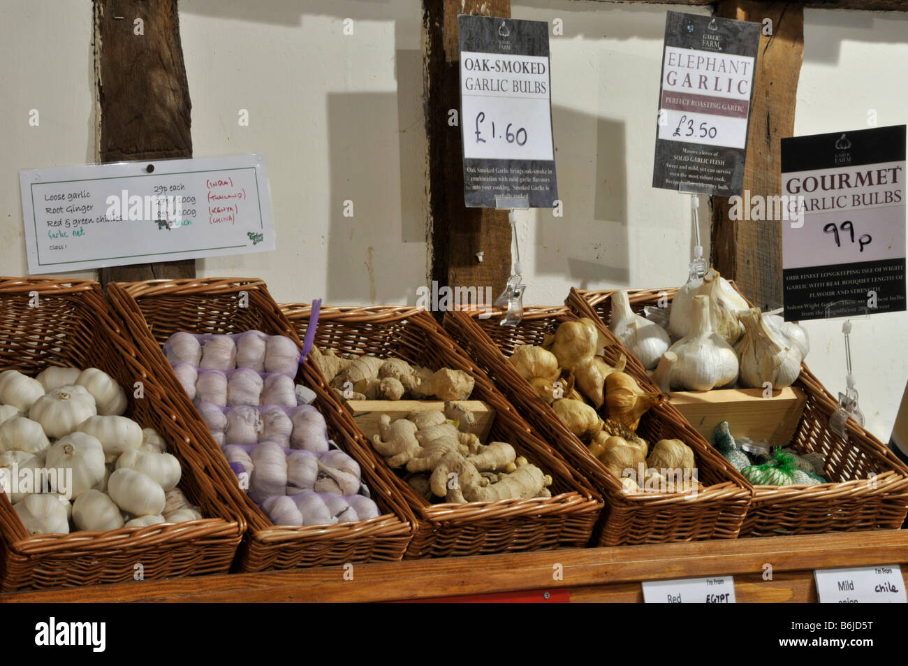 Garlic on sale in farm shop Stock Photo