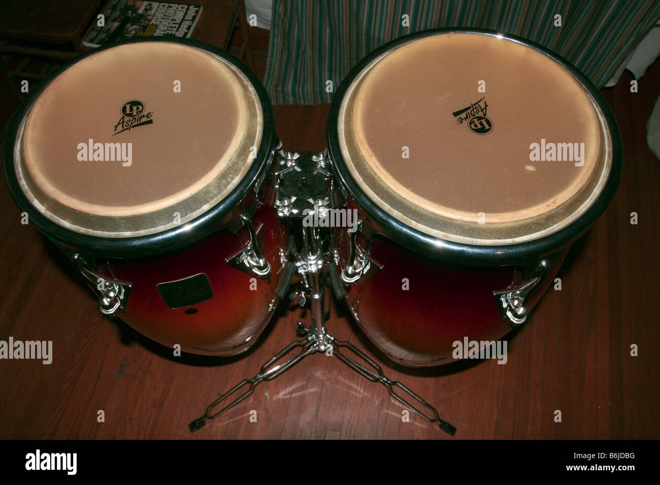 Two LP Latin Percussion hand-drums with sunburst finish, top. Quinto on left and conga on right. Stock Photo