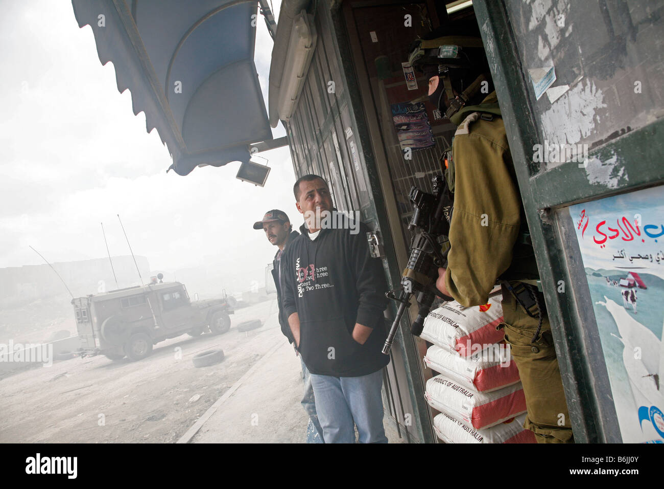 Israeli soldiers inside a Palestinian shop during clashes with