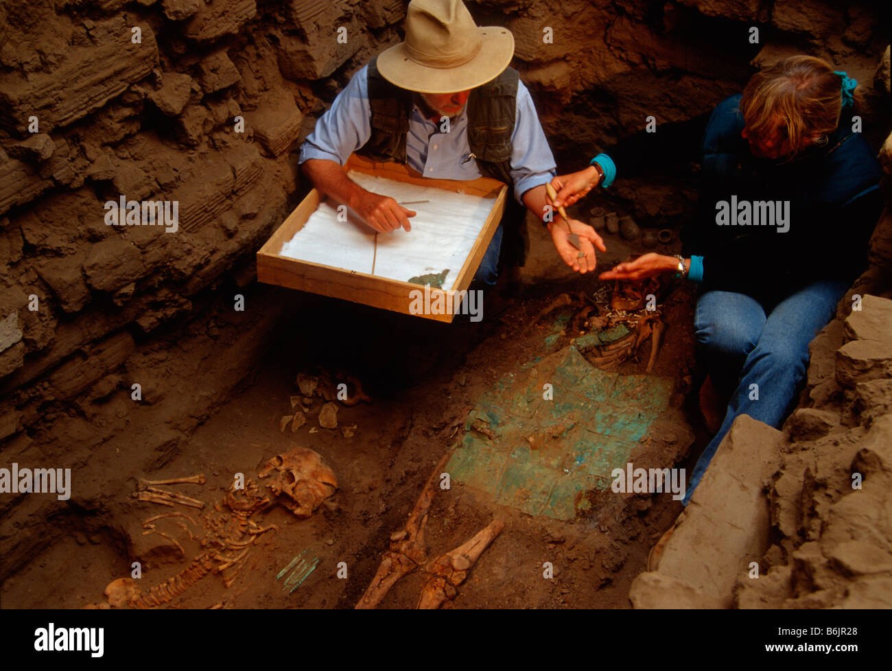 Christopher Donnan and Alana CordyCollins excavate gilded copper