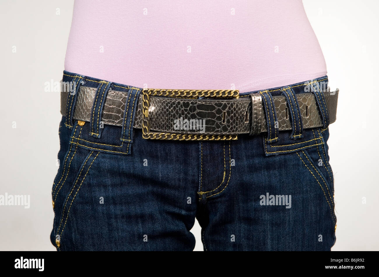 Slim woman wearing jeans Stock Photo - Alamy