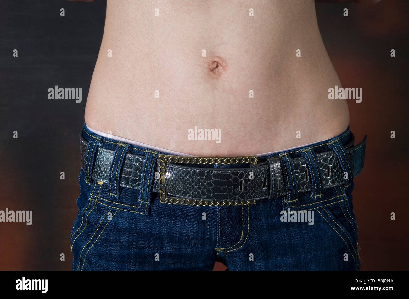 Slim topless woman Stock Photo - Alamy