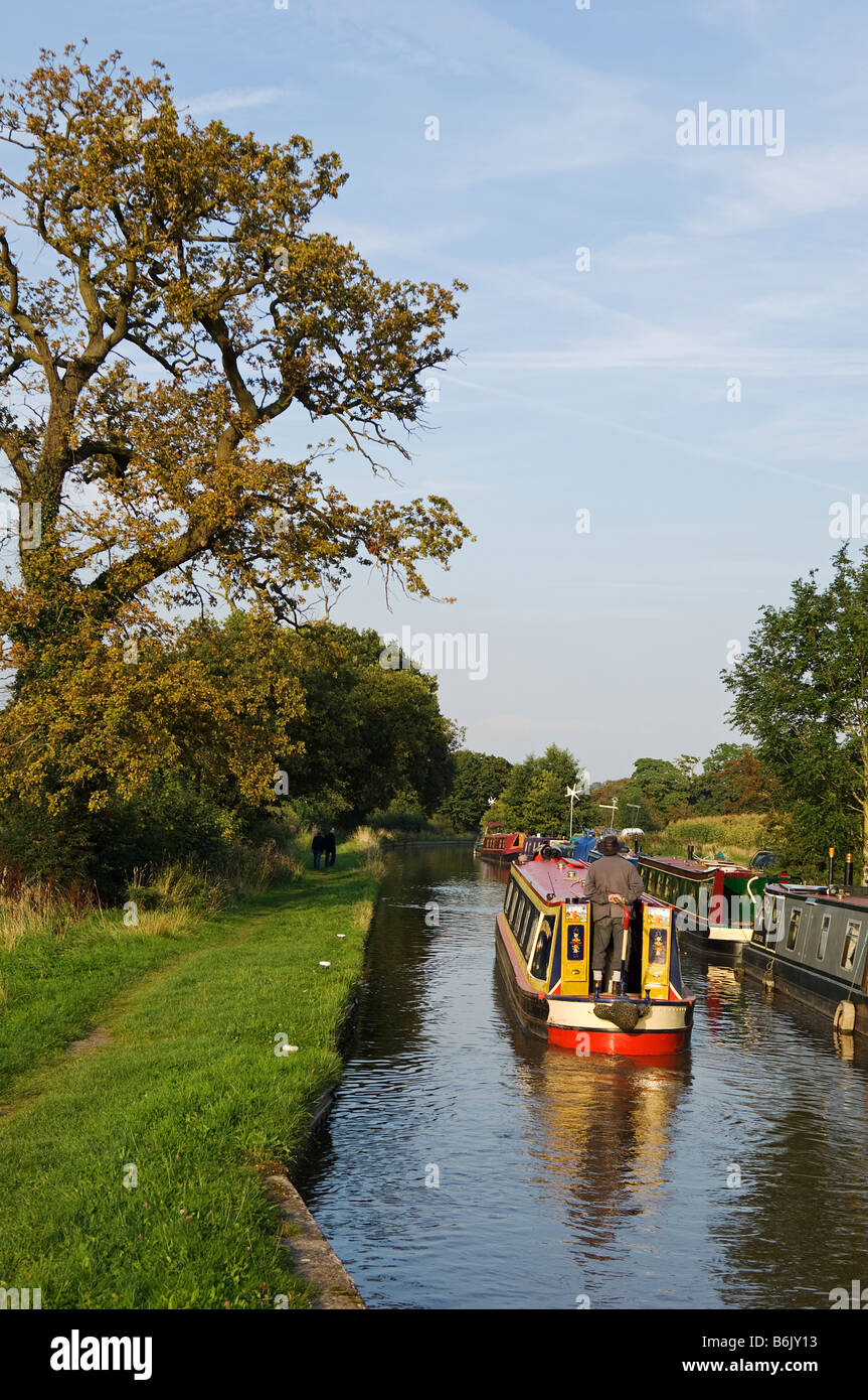 England, Shropshire, Whitchurch. Barges on a tranquil section of the Shropshire Union Canal