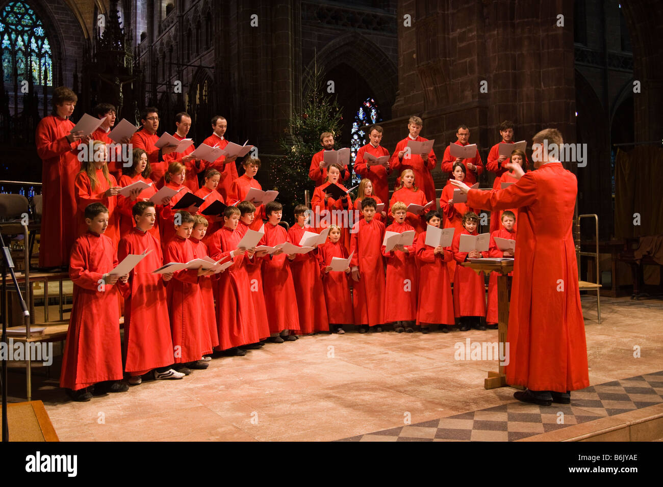 UK Cheshire Chester Cathedral Choir in rehearsal conducted by Philip Rushforth Stock Photo