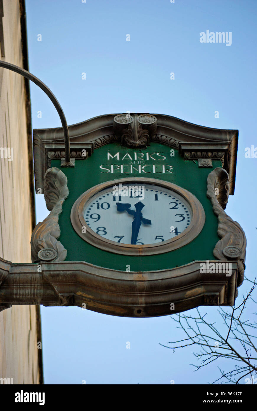 clock on exterior of marks and spencer store, hounslow high street