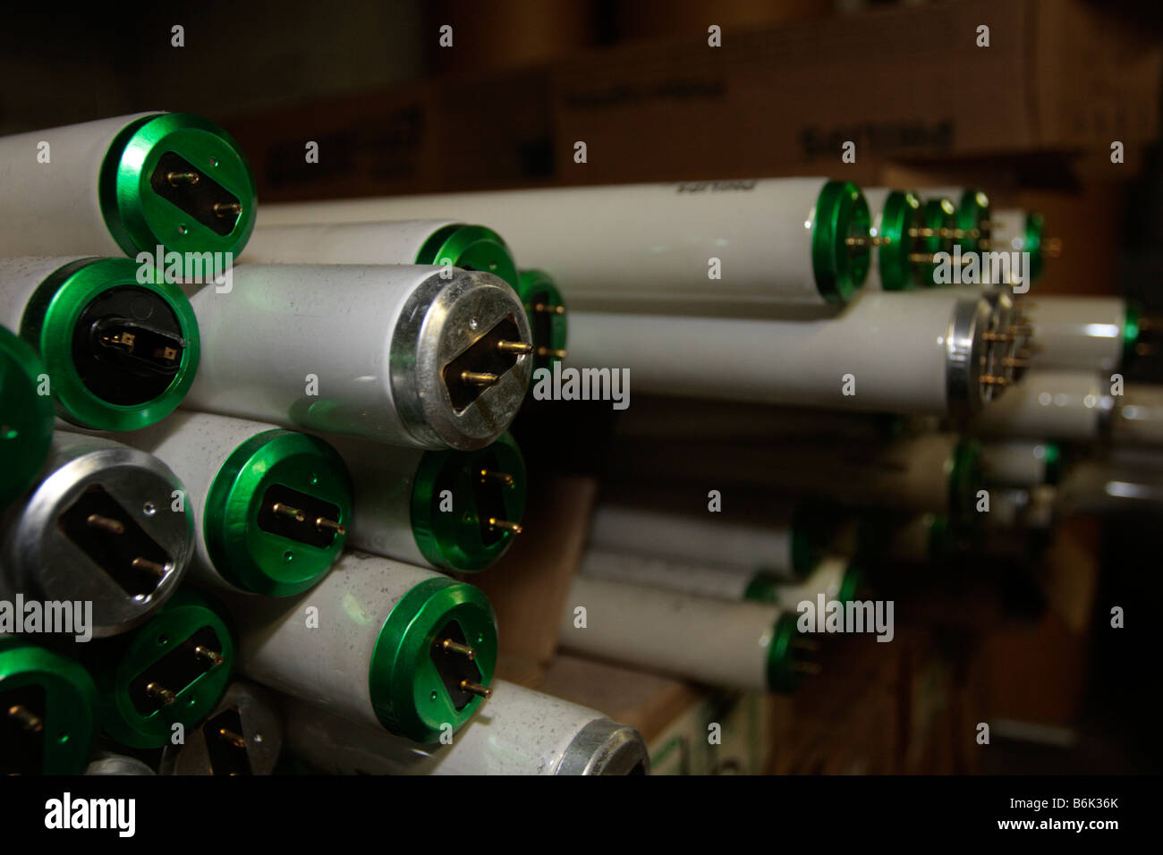 Ends of burned out tubetype fluorescent lightbulbs laying on sides Stock Photo Alamy