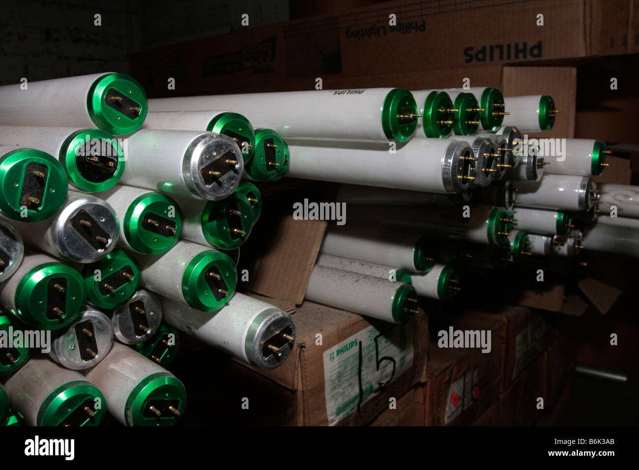 Ends of burned out tube type fluorescent lightbulbs laying on sides Stock Photo Alamy