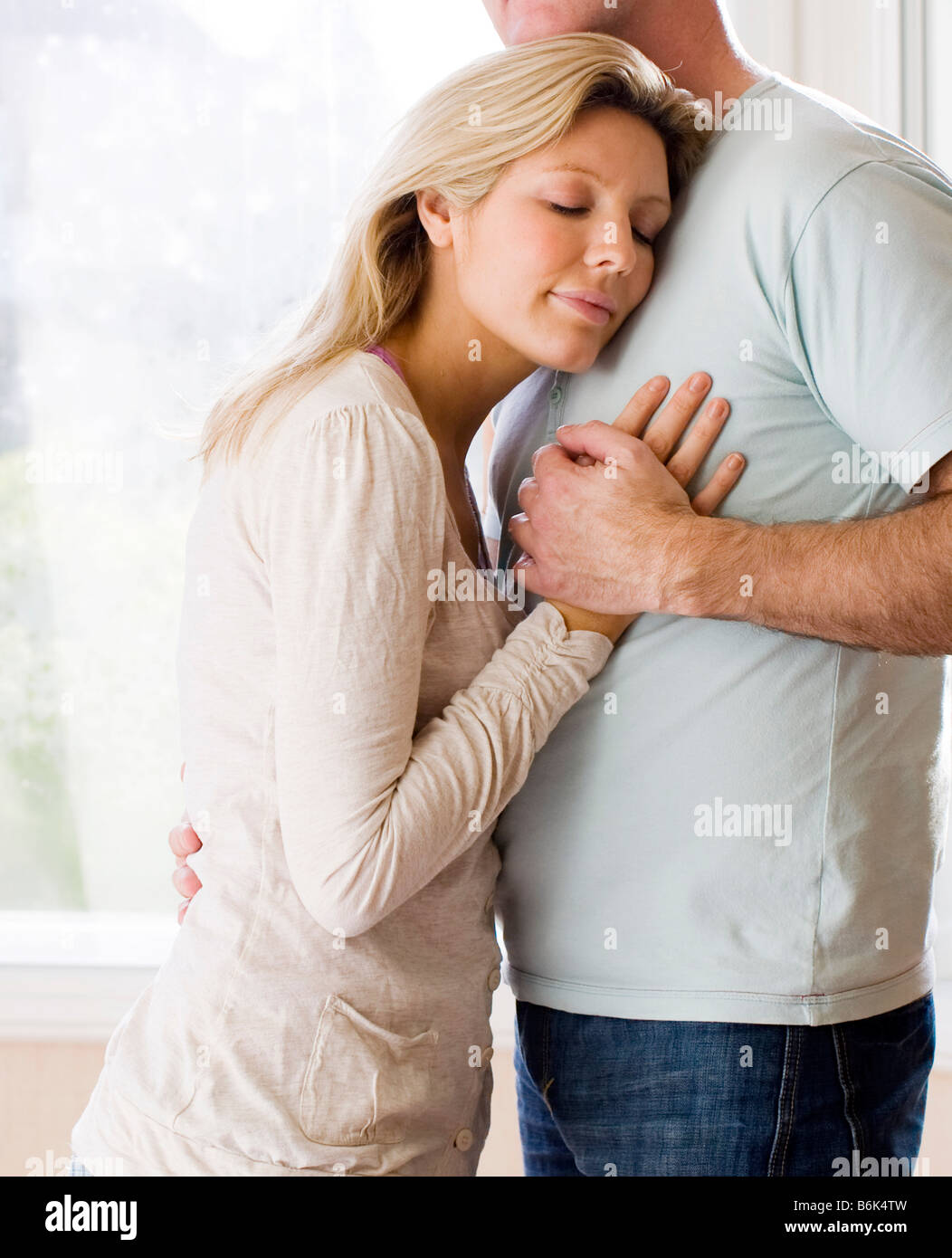 Couple cuddling Stock Photo Alamy
