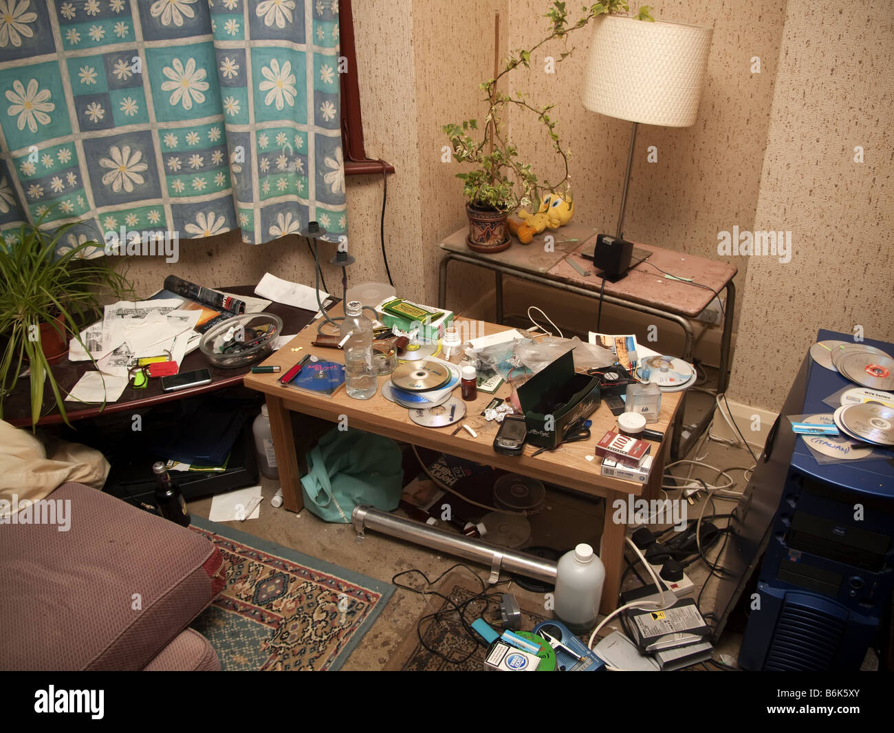 Crack Pipe in a messy room Stock Photo
