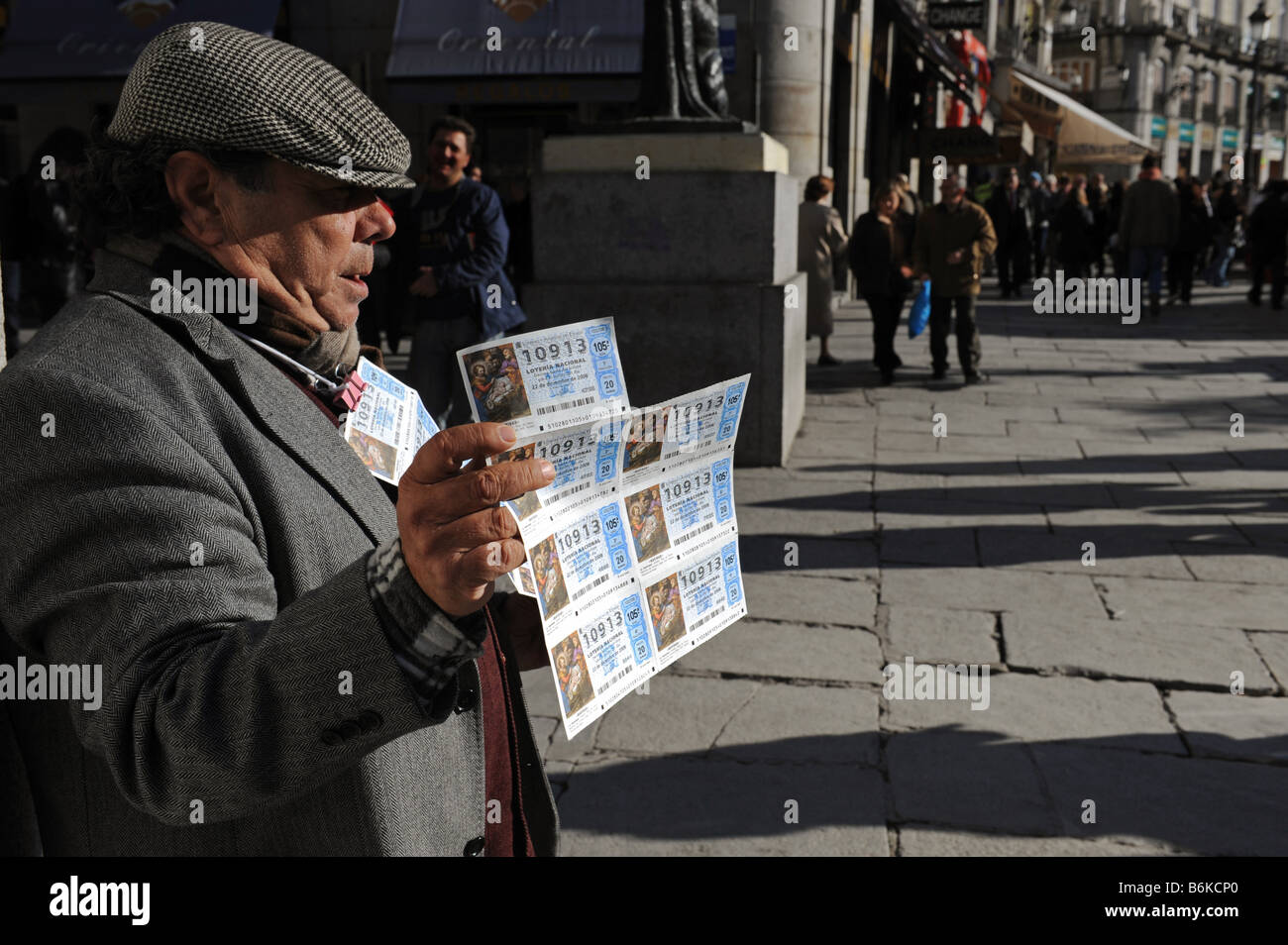 Man sells a Christmas of El Gordo national lottery ticket in Puerta del Sol Madrid Spain Stock Photo