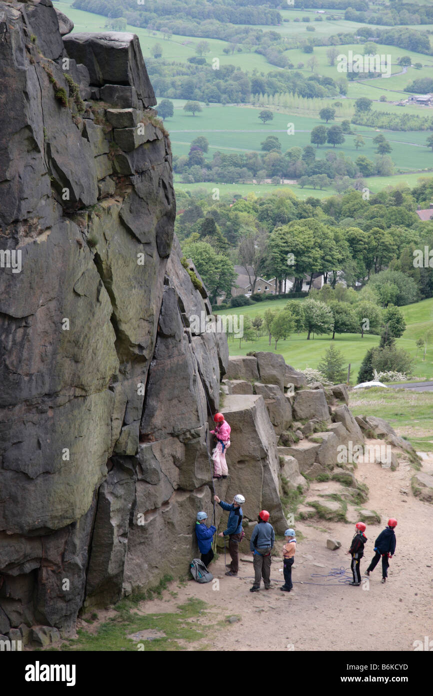 Rock climbing in the disused quarry by Cow and Calf rocks Ilkley moor