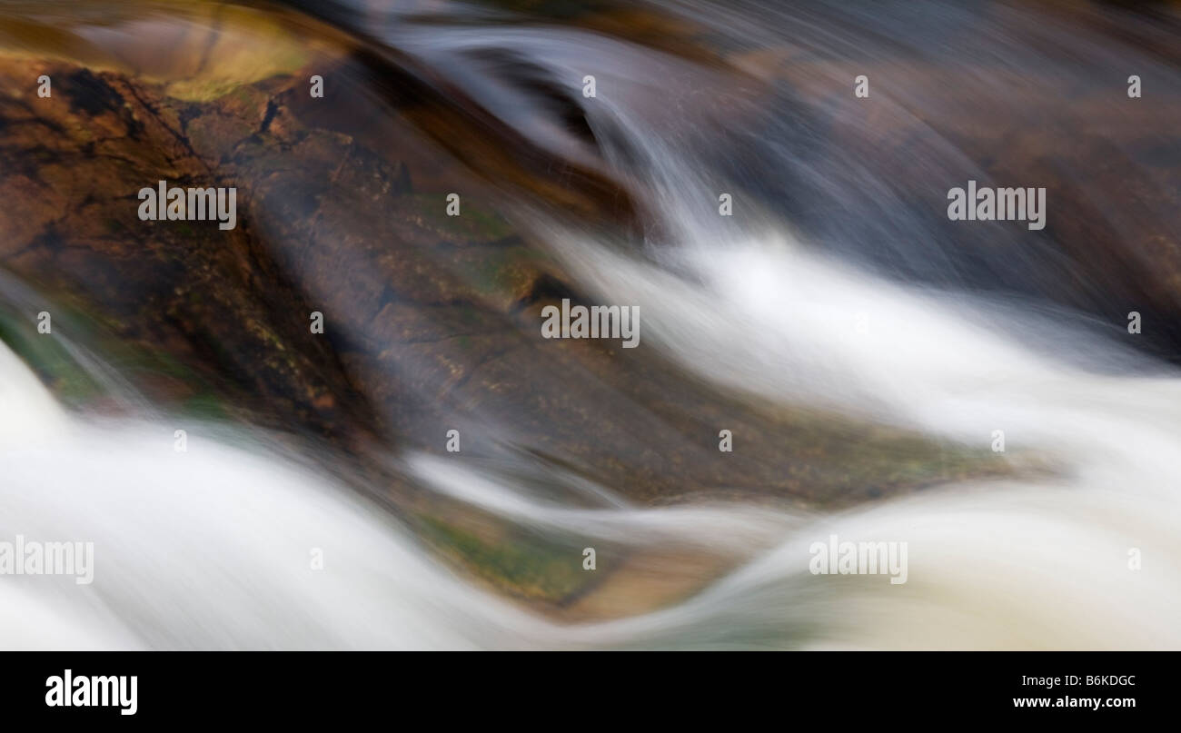 Rushing water in Glen Etive Highlands of Scotland Stock Photo - Alamy