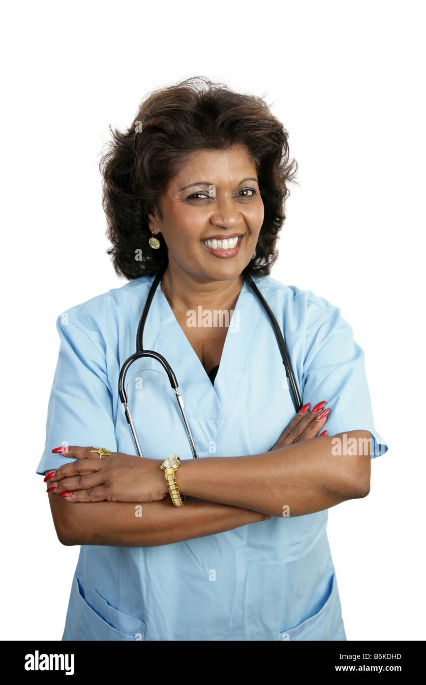 An attractive Indian doctor in scrubs isolated on white background