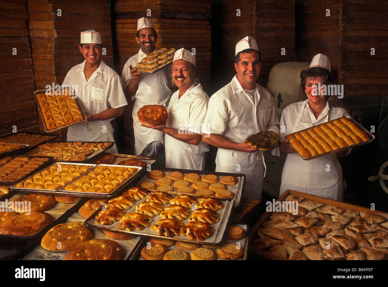 middle eastern bakers group occupations small business men woman ethnic Stock Photo