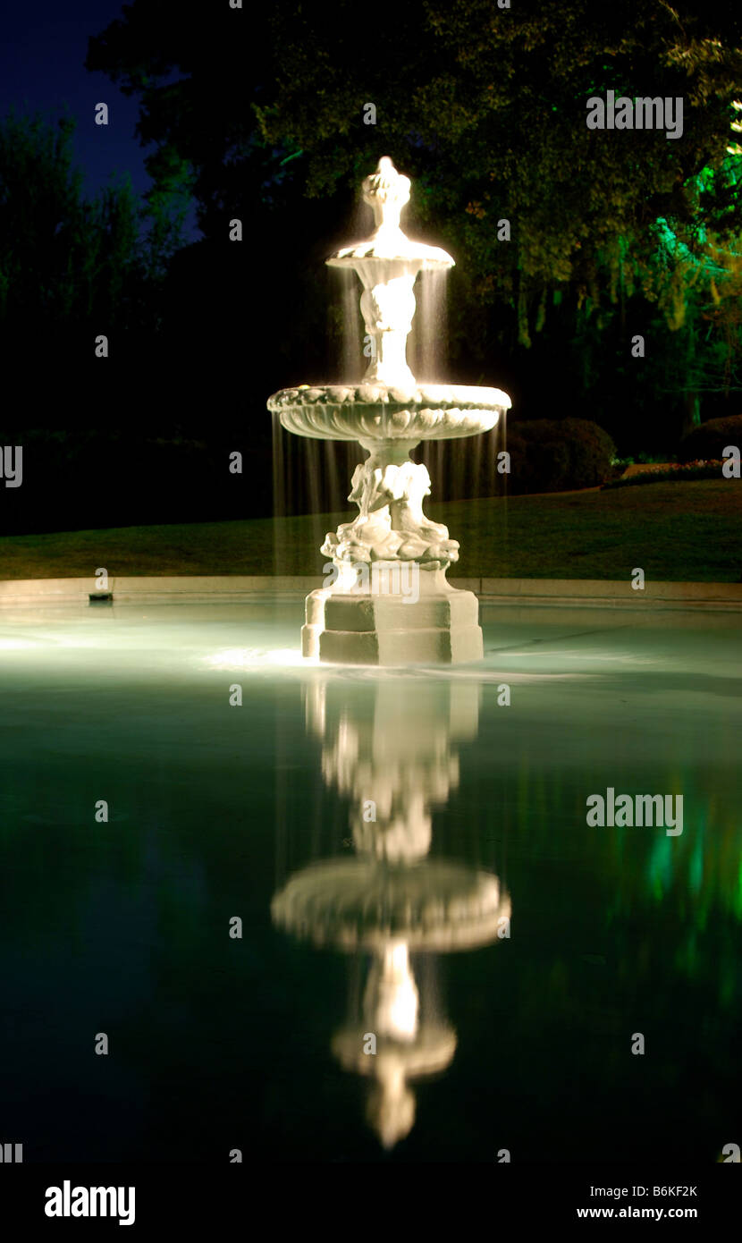 white fountain and pool at night Stock Photo - Alamy
