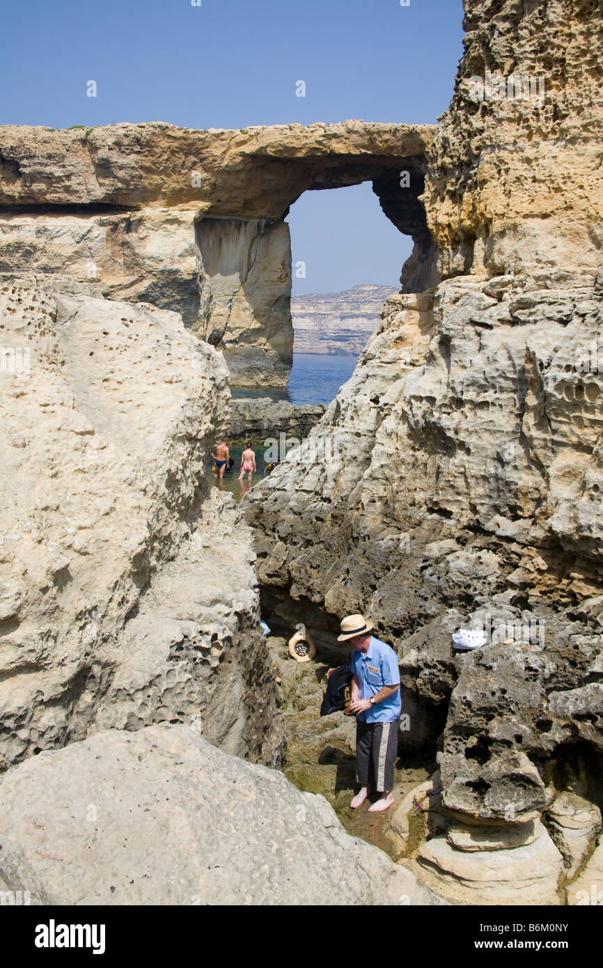 Tourists visiting the Azure Window, Tieqa Zerqa, Dwejra, Gozo, Malta Stock Photo
