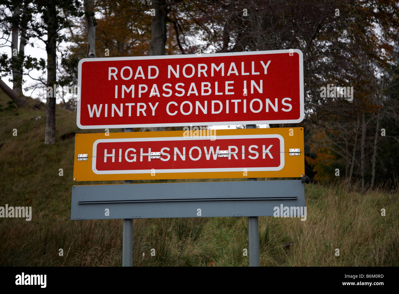 Road condition warning sign of high snow risk at Applecross, Wester Ross, Ross and Cromarty, Western Highlands, Scotland, UK Stock Photo