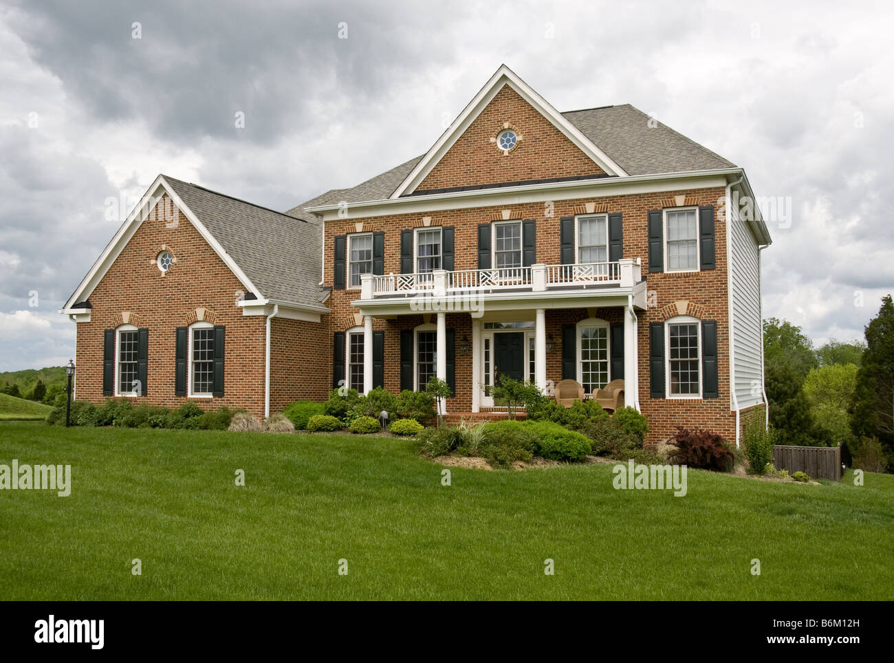 Front view of large modern single family house in the suburbs on a Stock Photo: 21338201 Alamy Front view of large modern single family house in the suburbs on a Stock Photo: 21338201 Alamy