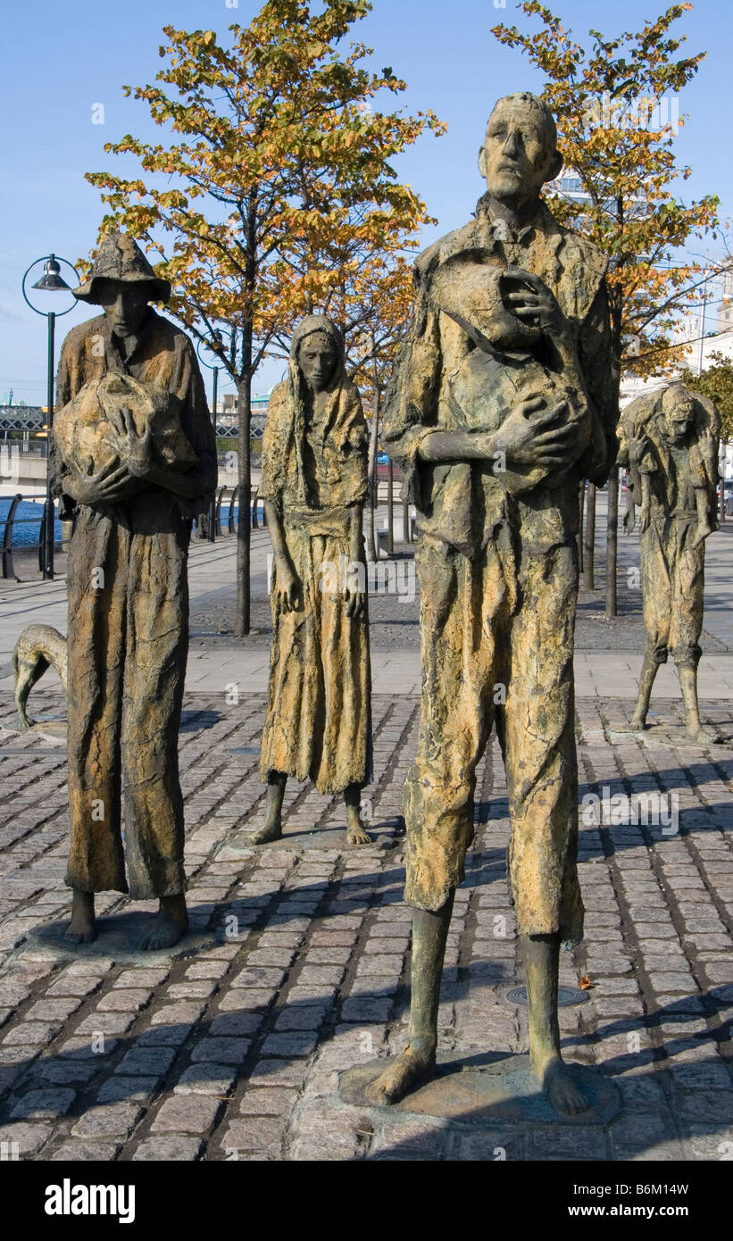 Famine sculptures by Rowan Gillespie, commemorating the victims of the Irish potato famine, on Custom House Quay, Dublin. Stock Photo