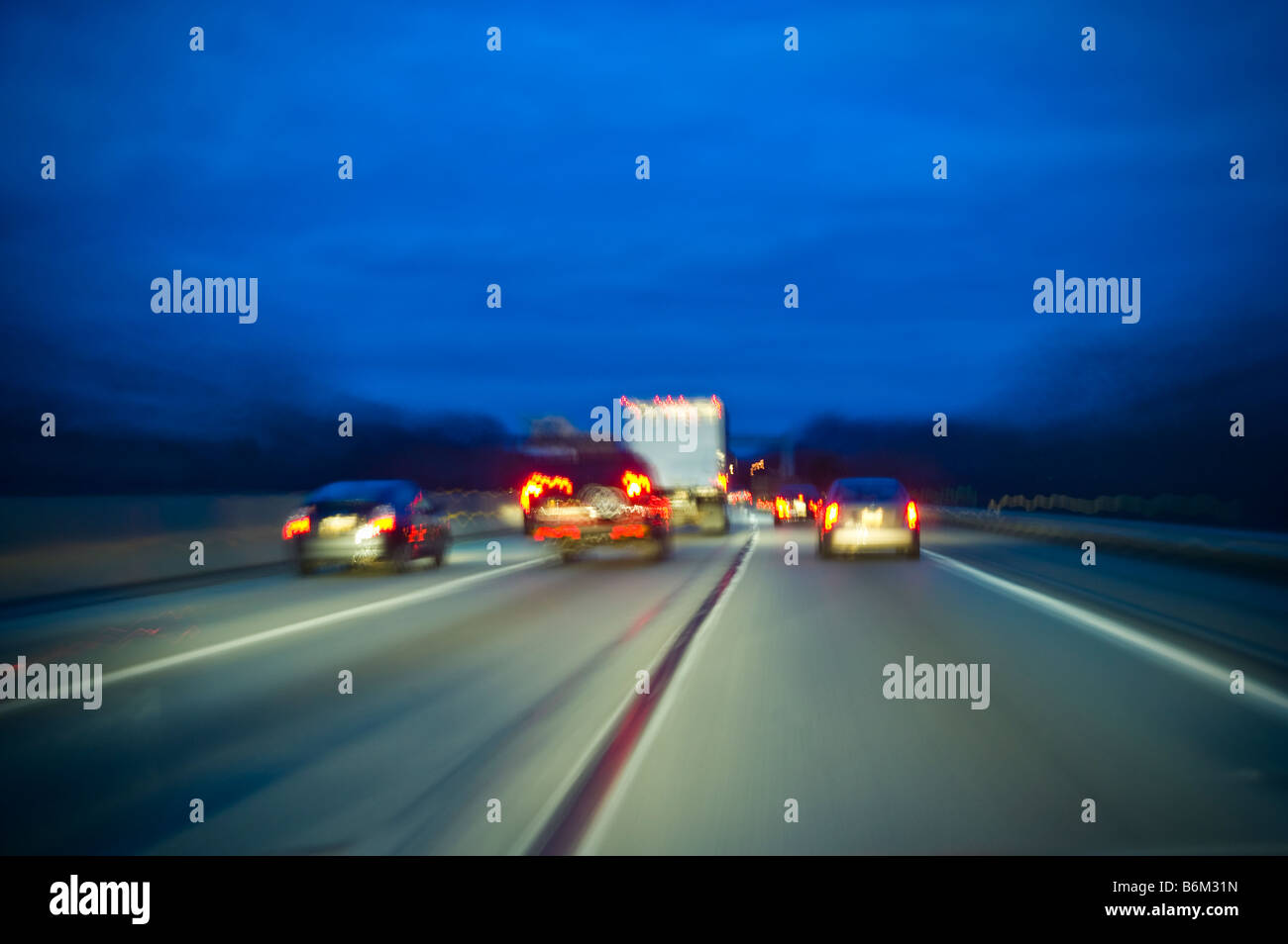 Cars On Highway At Night With Motion Blur Stock Photo