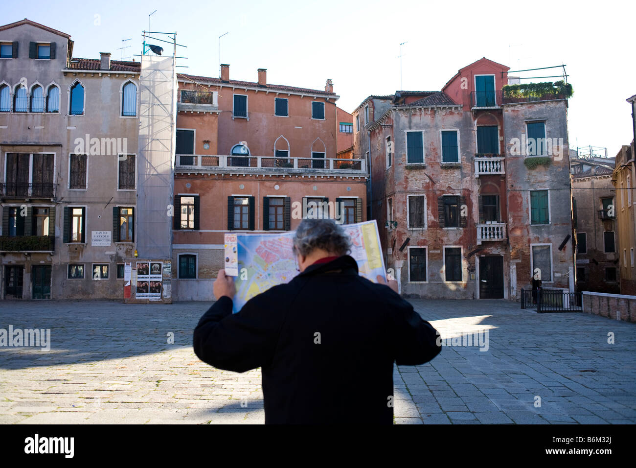 Venice, Italy. tourist looking at map in square Stock Photo