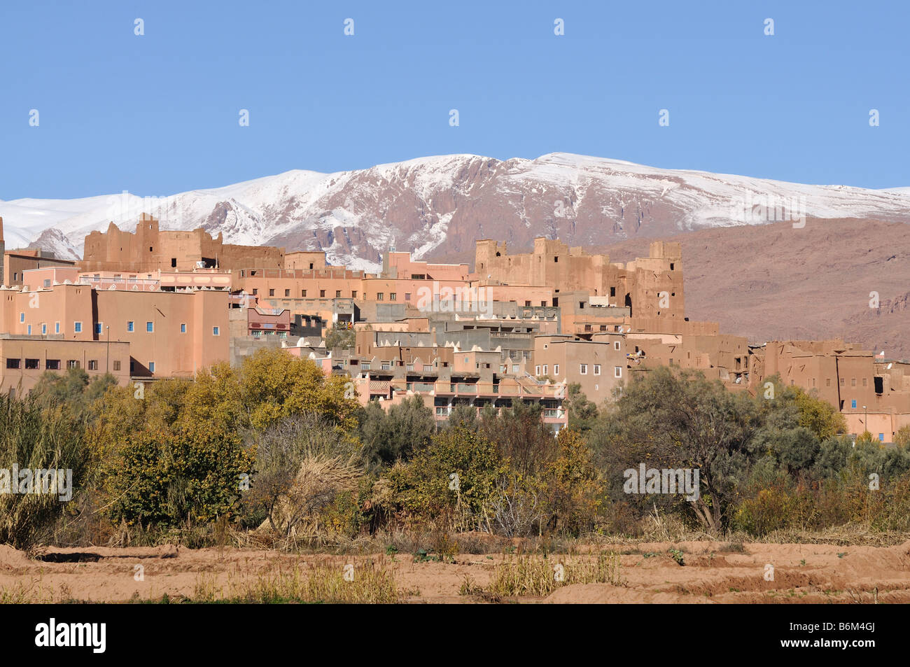 Moroccan village, Atlas mountains in the background Stock Photo