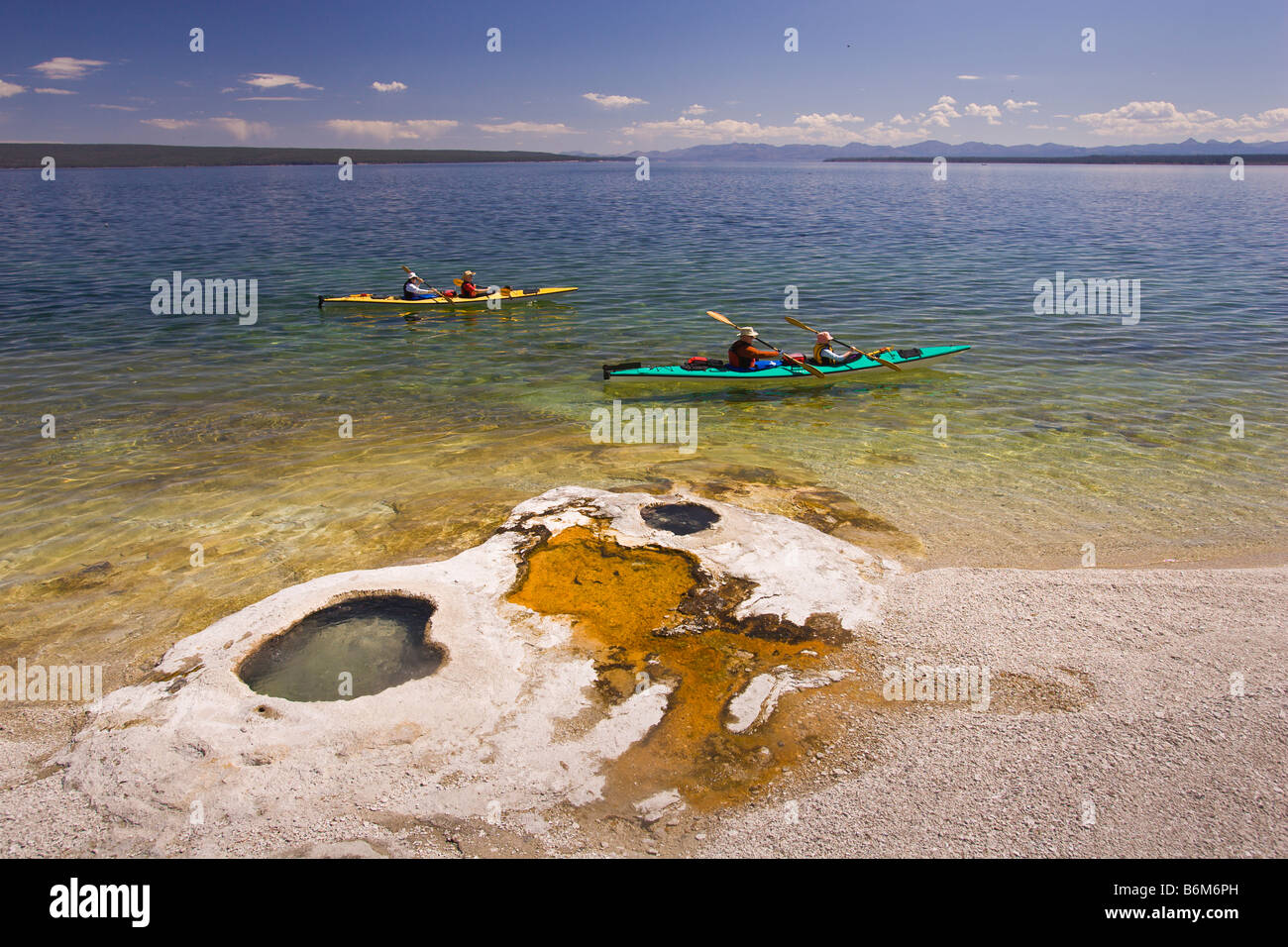 YELLOWSTONE NATIONAL PARK WYOMING USA - Tourists in kayaks on Lake Yellowstone at the West Thumb Geyser Basin Stock Photo