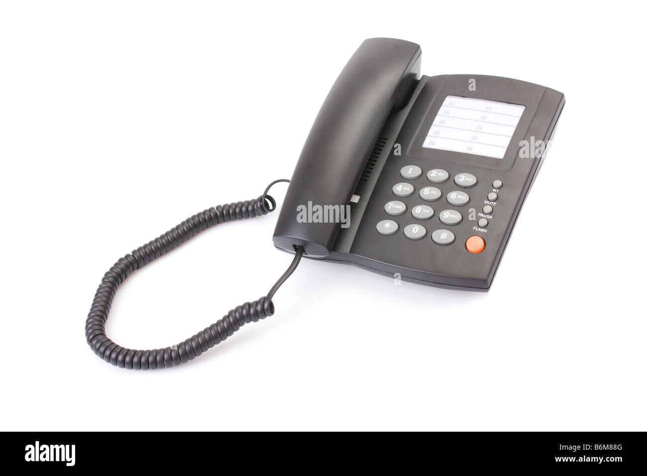 Office telephone with sinuous cord isolated on white Stock Photo