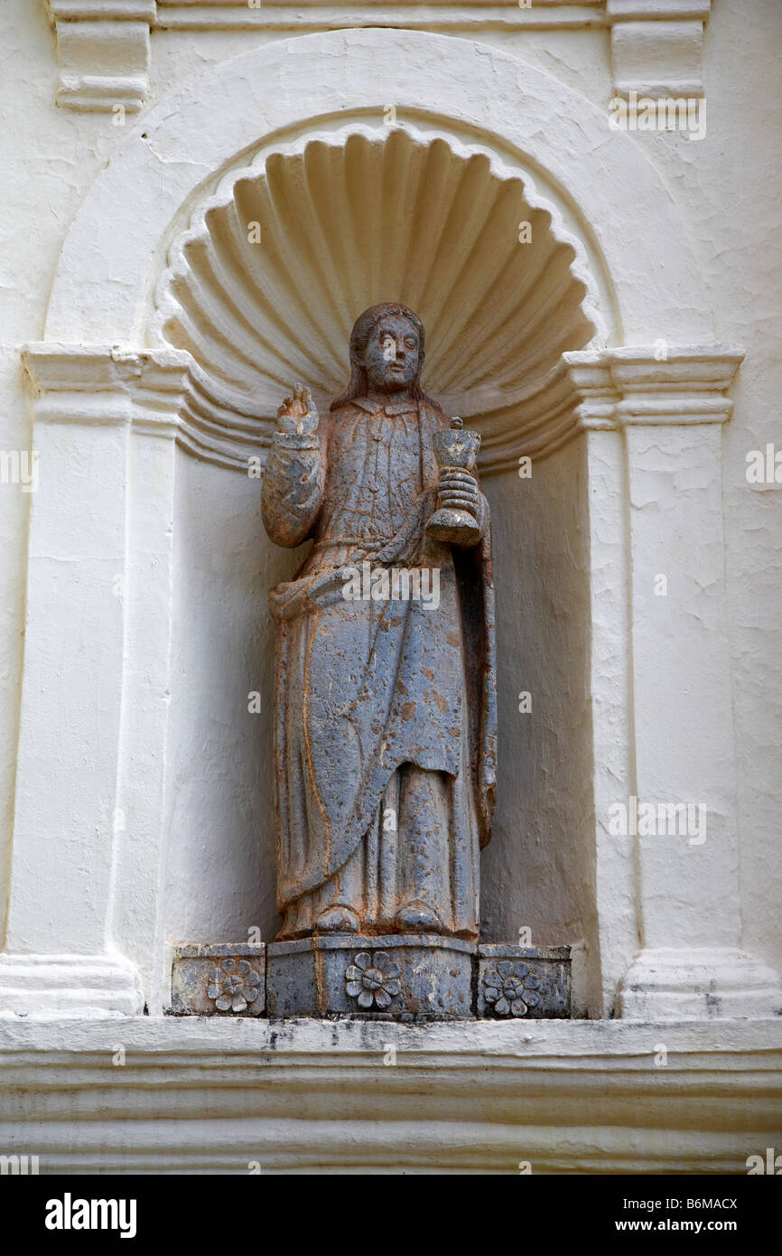 Statue of one of the Apostles in front of the Church of St. Cajetan, Old Goa, Goa, India Stock Photo