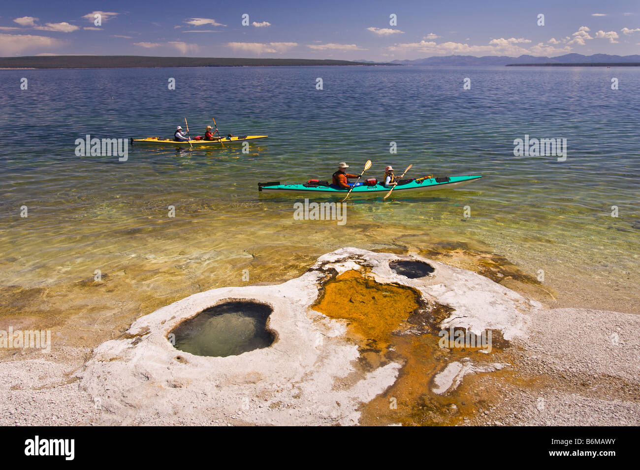 YELLOWSTONE NATIONAL PARK WYOMING USA - Tourists in kayaks on Lake Yellowstone at the West Thumb Geyser Basin Stock Photo