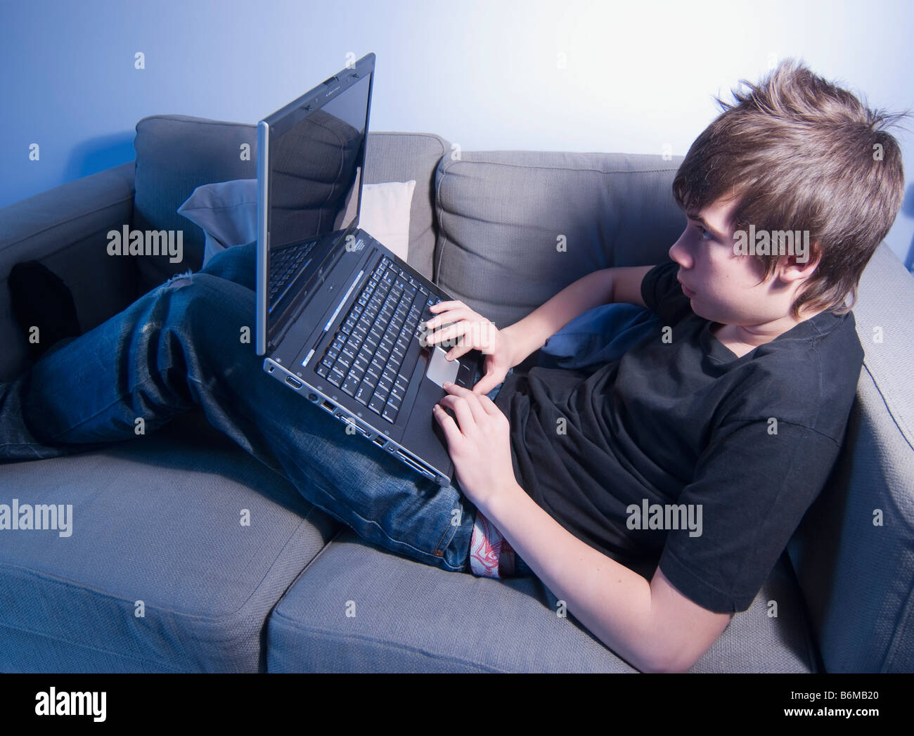 13 year old boy teenager with laptop computer Stock Photo Alamy