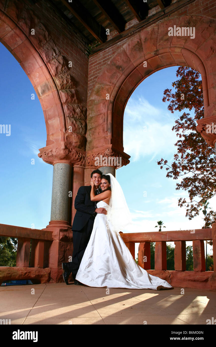 Beautiful Couple Outdoors on Their Wedding Day Stock Photo - Alamy