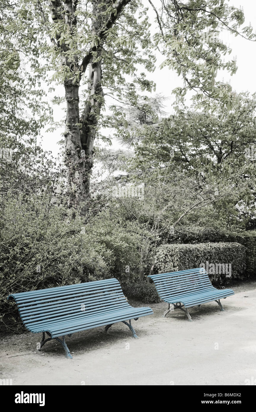Empty benches in a park in Paris. Stock Photo