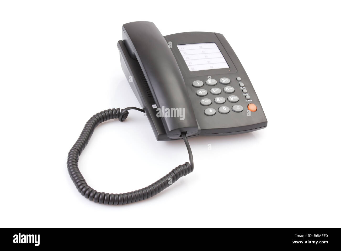 Office telephone with sinuous cord isolated on white. Stock Photo