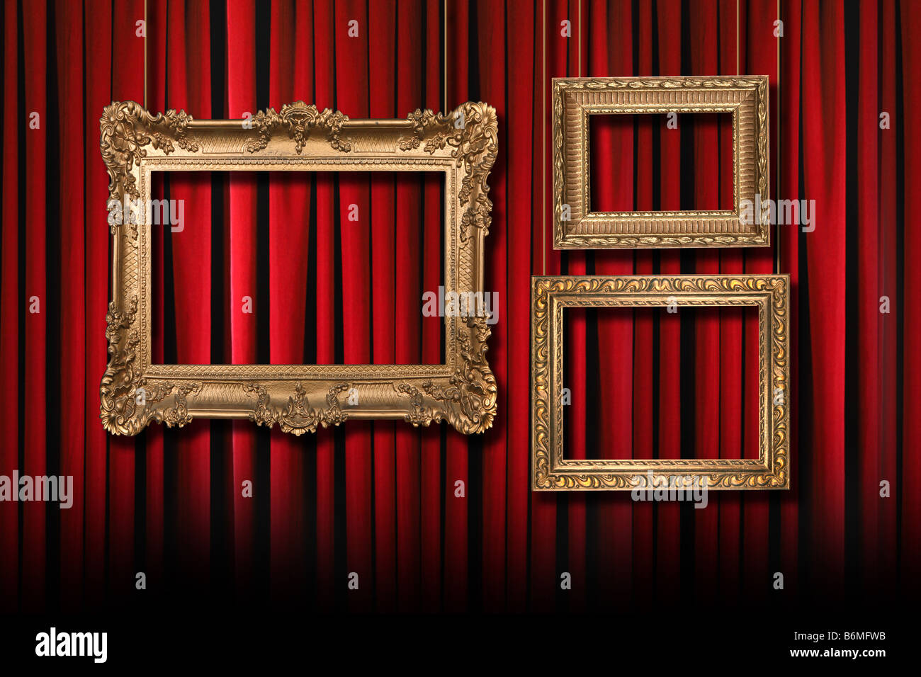 Red Stage Theater Curtains With 3 Hanging Gold Frames Stock Photo - Alamy