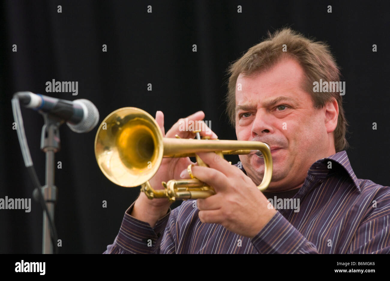 Brass instrument trumpet player hi-res stock photography and images - Alamy