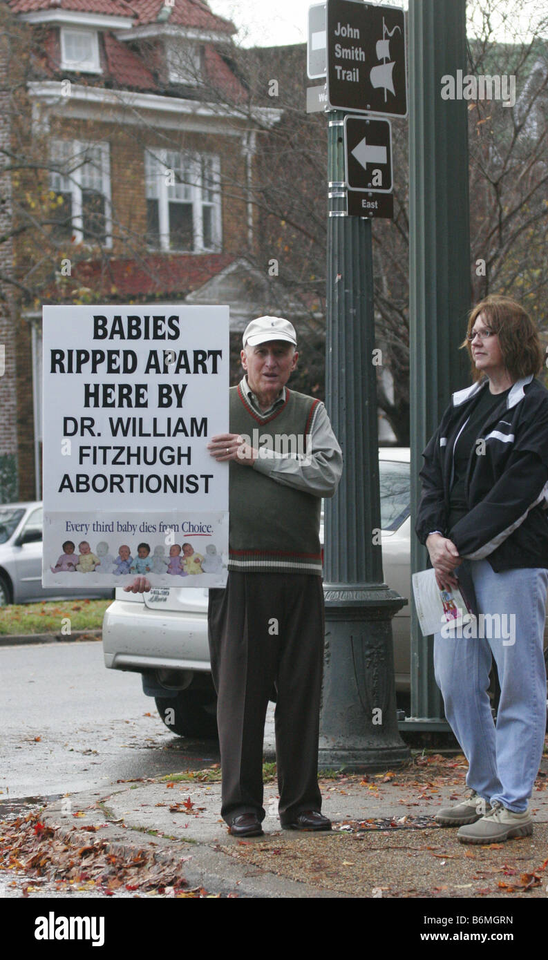 Anti-abortion protester outside of abortion clinic Stock Photo