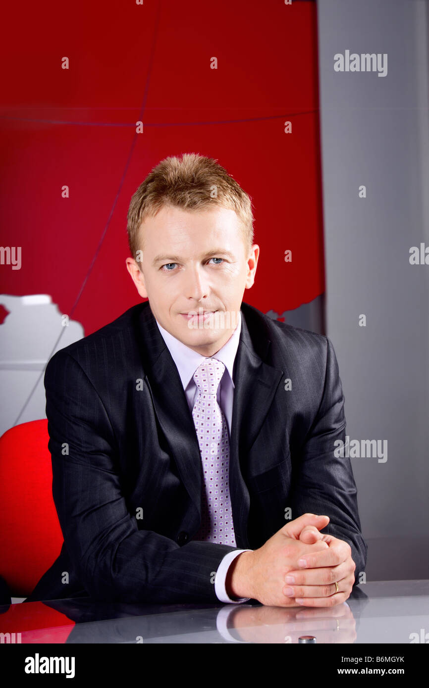 Television manager in office looking at camera Stock Photo Alamy