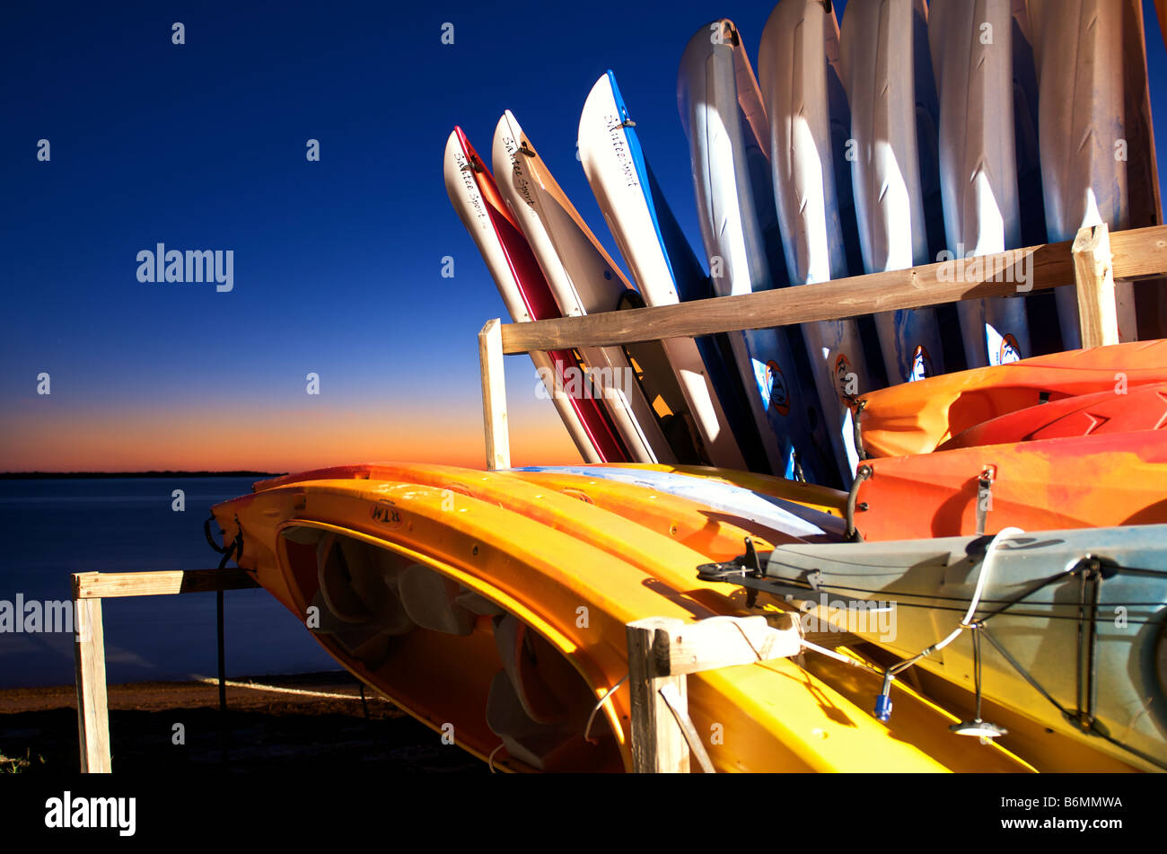 Colorful Kayaks lined up in Honeymoon Island Florida Stock Photo Alamy